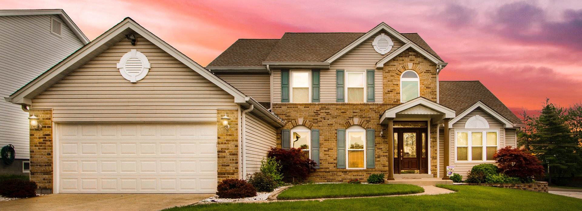 Brown stone and sided home